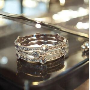 Stunning super shiny silver plated bangles w/  CZ stones, patterned design.